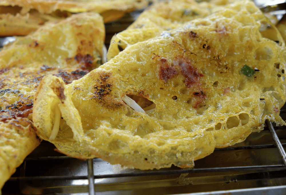 Vegan Banh Xeo with the perfect combination of fresh vegetables, shiitake mushrooms, and green beans creates an unforgettable flavor (Source: Canva)